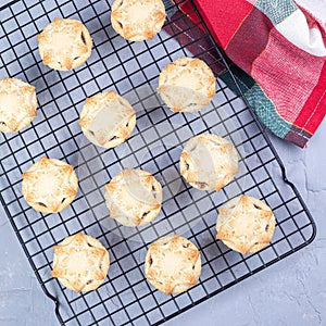 British Christmas mince pies or tarts with fruit filling, on cooling rack, top view, square