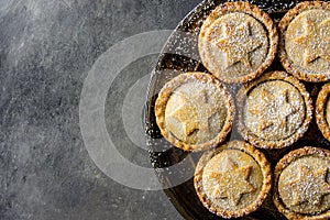 Traditional British Christmas Pastry Dessert Home Baked Mince Pies with Apple Raisins Nuts Golden Shortcrust Powdered