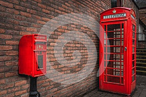 The traditional British public red mailbox and telephone kiosk or booth