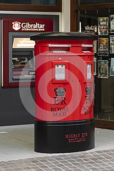 Traditional british red letter box and ATM Gibraltar