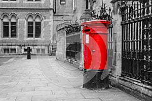 The traditional British red post box in London