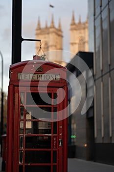 Traditional British red telephone booth in the street