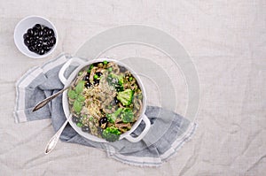 Traditional brown pasta with green vegetables
