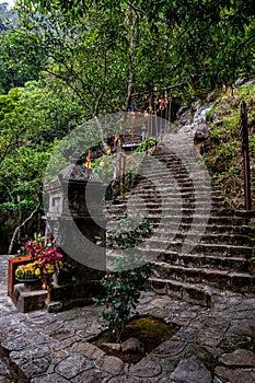 Asian Buddhist Temple Shrine with stairs leading up to temple at Yen Tu Mountain