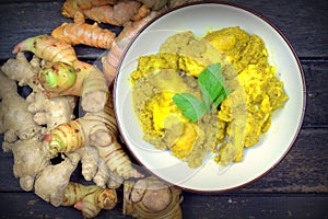 Traditional Bugis people food, Chicken with herbs and spices photo