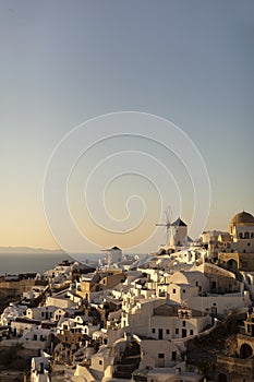 Traditional buildings in Oia, Santorini during sunset