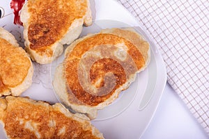 Traditional Bulgarian, Balkan homemade dough breakfast Mekitsi, Mekici fried in deep oil