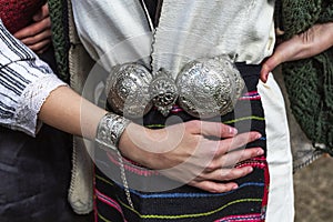 Traditional Bulgarian silver belt buckle on ladies costume