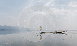 Traditional Burmese leg rowing fisherman at Inle lake, Myanmar