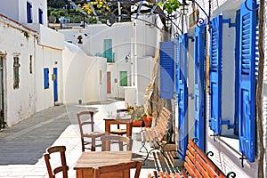 Traditional cafe in the street of Lefkes town photo