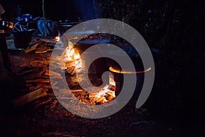 Traditional Cambodian Khmer Wedding Food for a Feast Cooking over Fires at Night