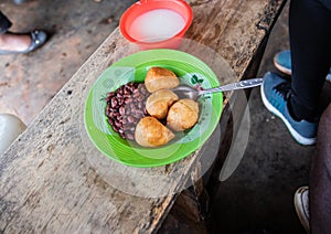 Traditional cameroonian food, beignets haricots, a typical african breakfast photo