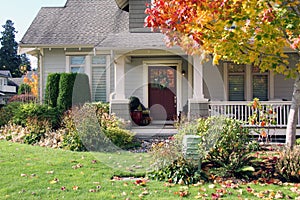 Traditional Canadian house with a large front yard.