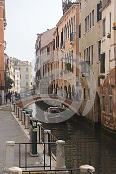 Traditional canal in Venice with its sidewalk