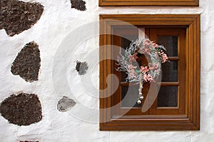 Traditional Canarian window with Christmas decoration on Tenerife island, Spain