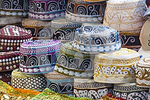 Traditional caps at ancient Mutrah Souq, Muscat, Oman photo