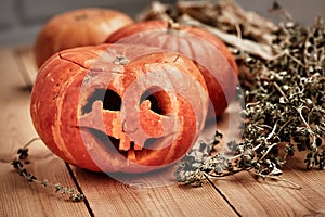 Traditional carved pumpkin lantern for celebrating Halloween