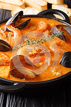 Traditional Catalan recipe: Suquet de Peix Seafood soup, vegetab