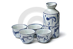 Traditional ceramic Chinese sake set close up on white background