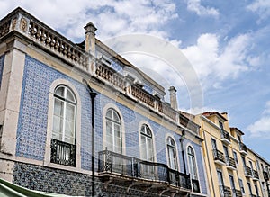 Traditional ceramic tiles decorate exterior of large house in Lisbon