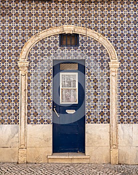Traditional ceramic tiles decorate exterior of large house in Lisbon