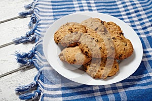 Traditional cereal oatmeal cookies with raisins and chocolate healthy sweet