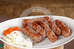 Traditional cevapcici with ajvar paste