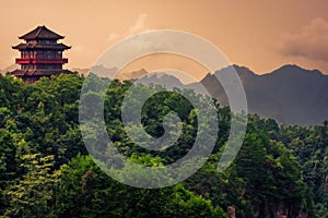 Pagoda on top of a mountain peak in Zhangjiajie NP photo