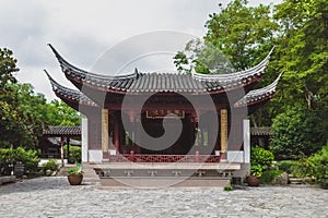 Traditional Chinese architecture among trees on Tiger Hill Huqiu, Suzhou, Jiangsu, China