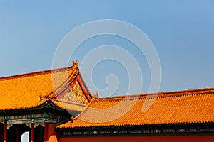 Traditional Chinese architecture with yellow roof tiles, in Forbidden City, under blue sky, in Beijing, China