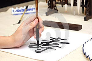 Traditional Chinese calligraphy Master writing character translation means longevity. Asian art equipment and tools