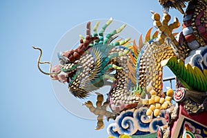 Traditional Chinese Ceramic Dragon sculpture on Roof Shrine