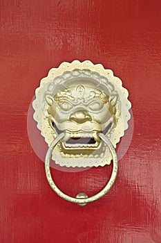 Traditional Chinese door knocker with dragon as symbol of guardian