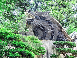 Traditional chinese dragon sculpture at Yu Gardens, Shanghai, China