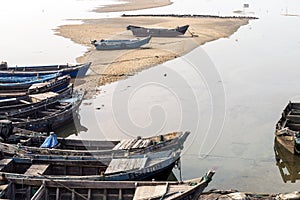 Traditional Chinese fishing boats on still water