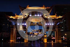 Traditional Chinese gate in Kunming city at night
