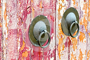 Weathered old oriental doorknock