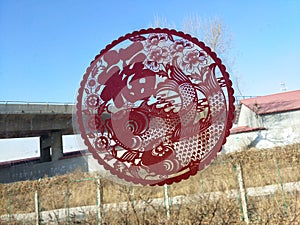 Traditional Chinese Paper-cut Pasted on the Window