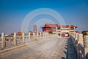 Traditional Chinese pavilion in Penglai, immortals pavilion, bridge to the island, Yantai, Shandong, China. Copy space for text
