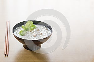 Traditional chinese rice gruel in bowl