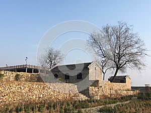 Traditional Chinese rural dwellings made of old stone houses