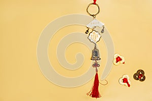 Traditional chinese talisman with coins on yellow, Chinese New Year concept