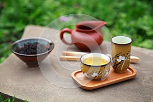 Traditional chinese tea ceremony accessories (tea cups and pitch