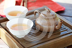 Traditional chinese tea ceremony accessories (tea pot and cups w