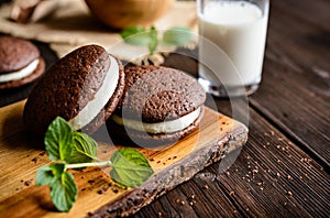 Traditional chocolate Whoopie pies filled with cream