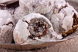 Traditional Christmas almond chocolate snowballs cookies biscuits covered icing sugar powder. Russian Tea Cakes, Mexican Wedding