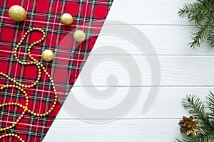 Traditional Christmas background. Scottish checked fabric and go