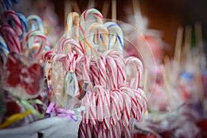 Traditional Christmas candy cane lollipops.