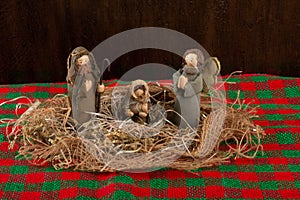 Traditional Christmas decoration. Nativity scene with Christ`s birth. Rustic