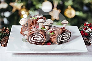 Traditional Christmas dessert called Yule log or bÃ»che de NoÃ«l